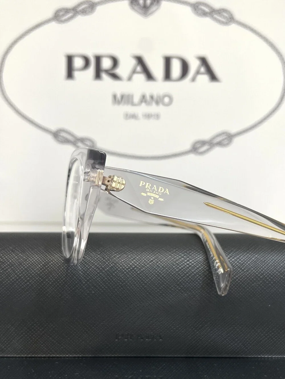 PRADA Milano Eyeglasses color VPR A18 clear/transparent crystal with gold detail